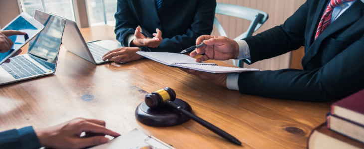Lawyers discussing a contract