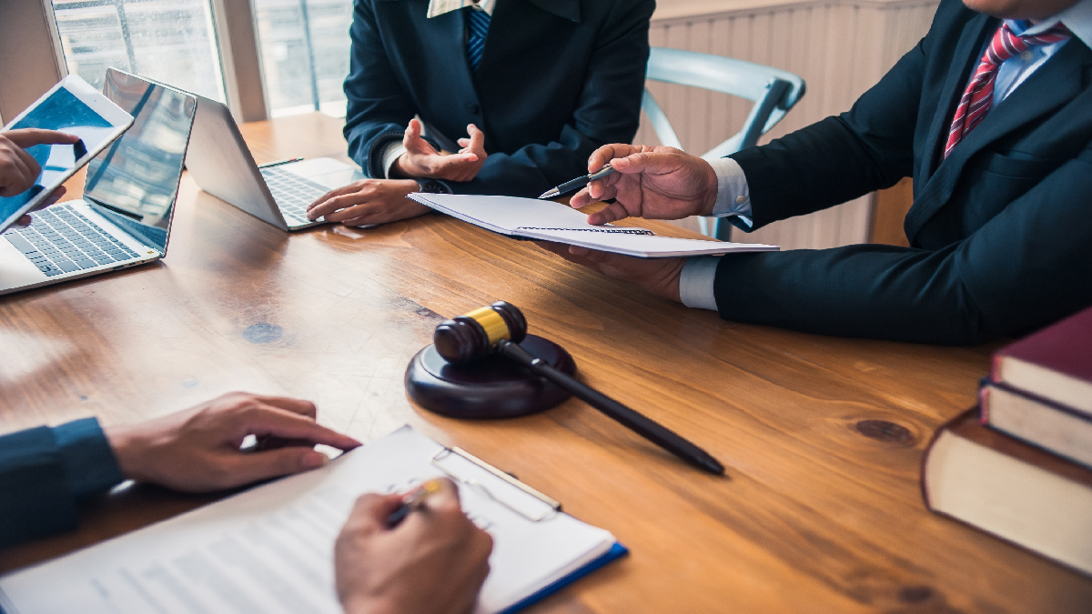 Lawyers discussing a contract