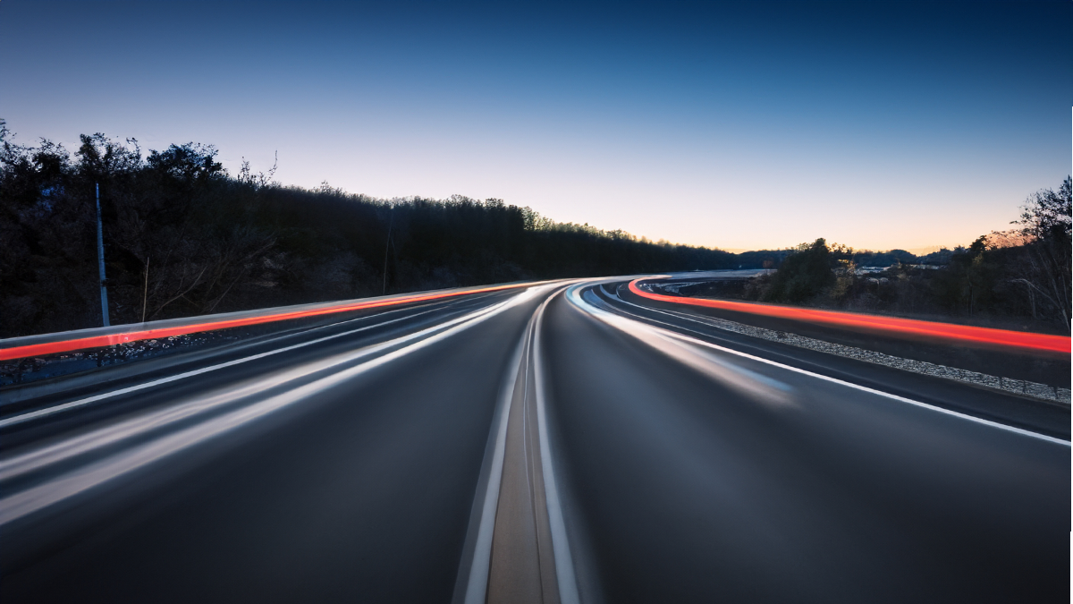 Speeding car along highway