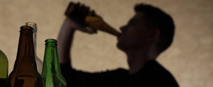 Man drinking at a party