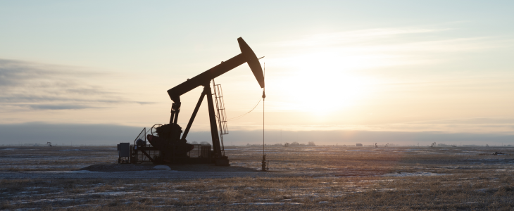 Oil well in a large field