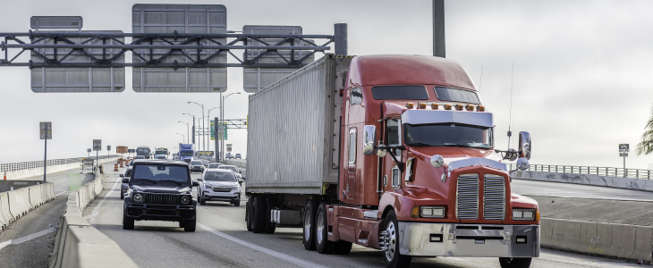 Commercial vehicle driving down a highway