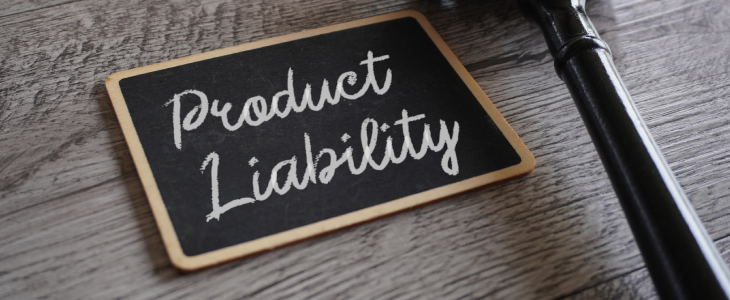 Product liability written on a wooden board