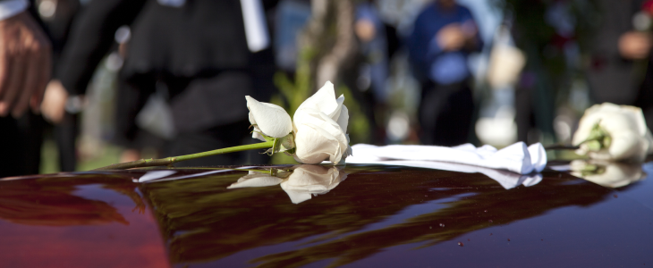 Casket with a rose on it