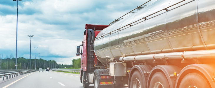 Oil truck driving on a highway