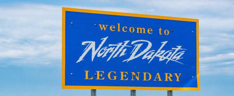 MCLAUGHLIN, ND - JULY 9, 2018: North Dakota welcome sign along the highway at the state border