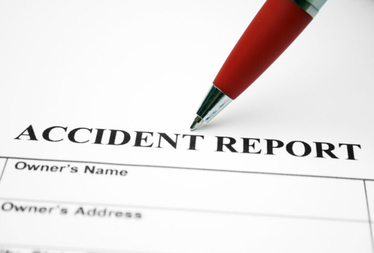 Close up of pen on Accident report