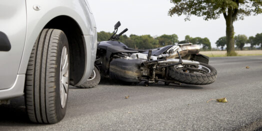 Motorbike Accident on the road with a car