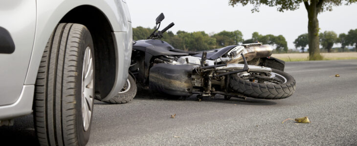 Motorbike Accident on the road with a car