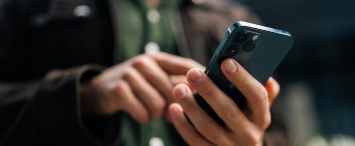 man answering a call from an insurance company.