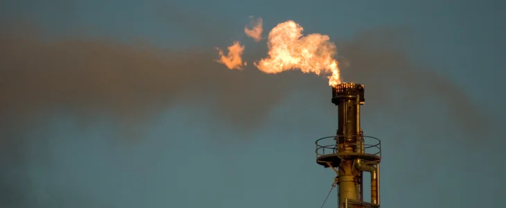 Oil refinery with a fire on top