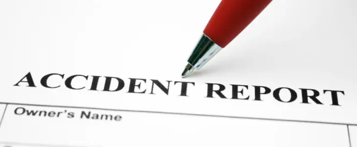 Close up of pen on Accident report